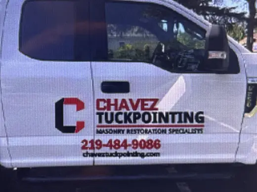 White van with bold business lettering and phone number
